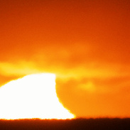 <font class="tempImageTitleThumbText">Partial Solar Eclipse At Sunrise</font><br>John Stetson<br>Jun 10 12:10pm<br>overlooking Casco Bay from Cape